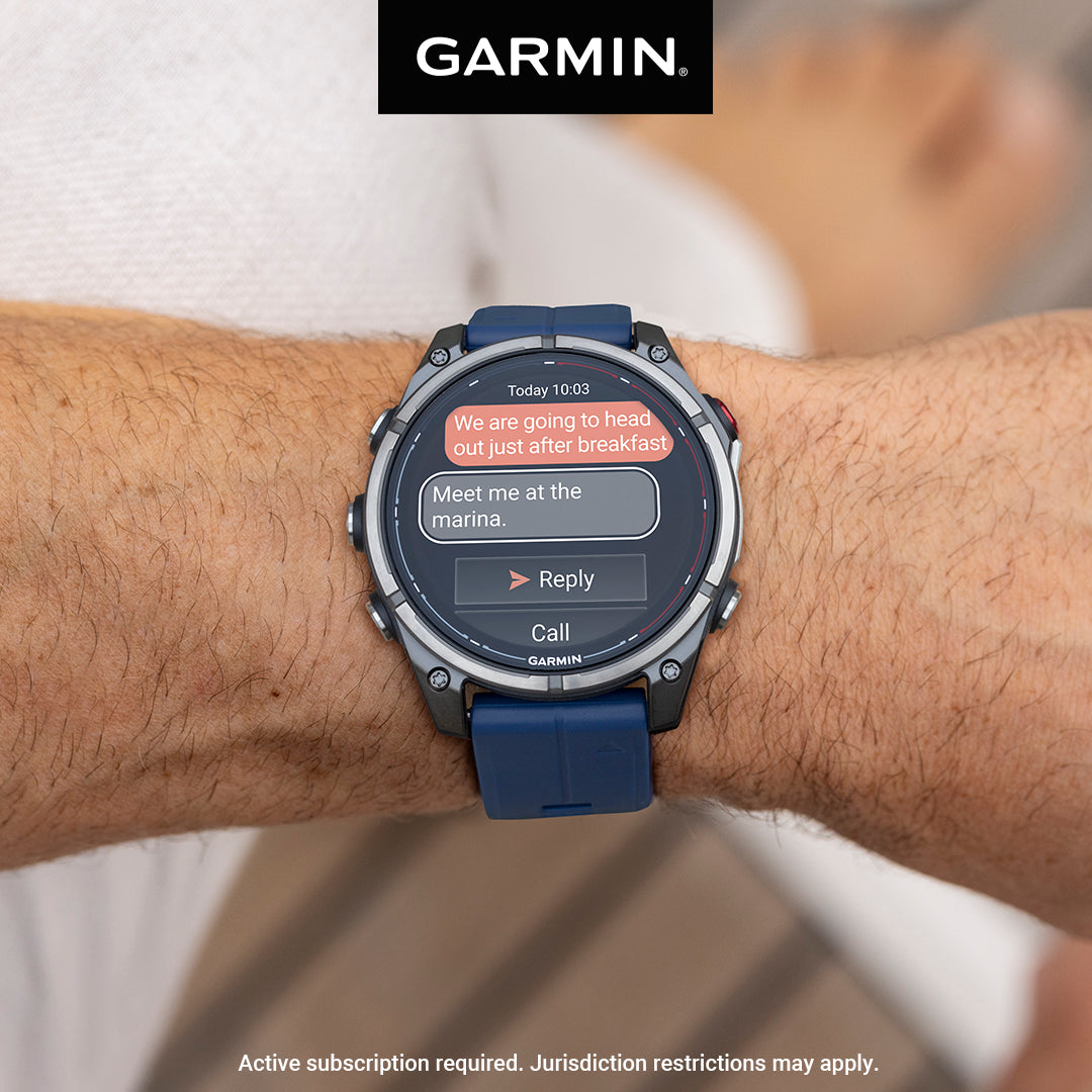 Garmin quatix 8 Pro nautical smartwatch on wrist, receiving a marina text message